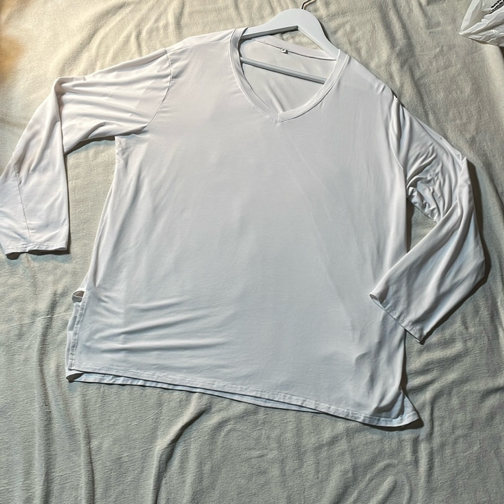 Whit V neck long sleeve shirt. Lightweight and soft material XL